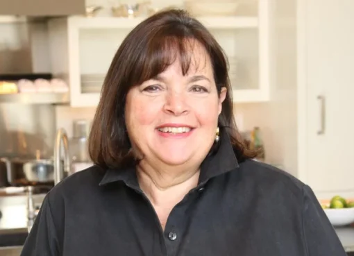 Chef Ina Garten smiling in her kitchen.