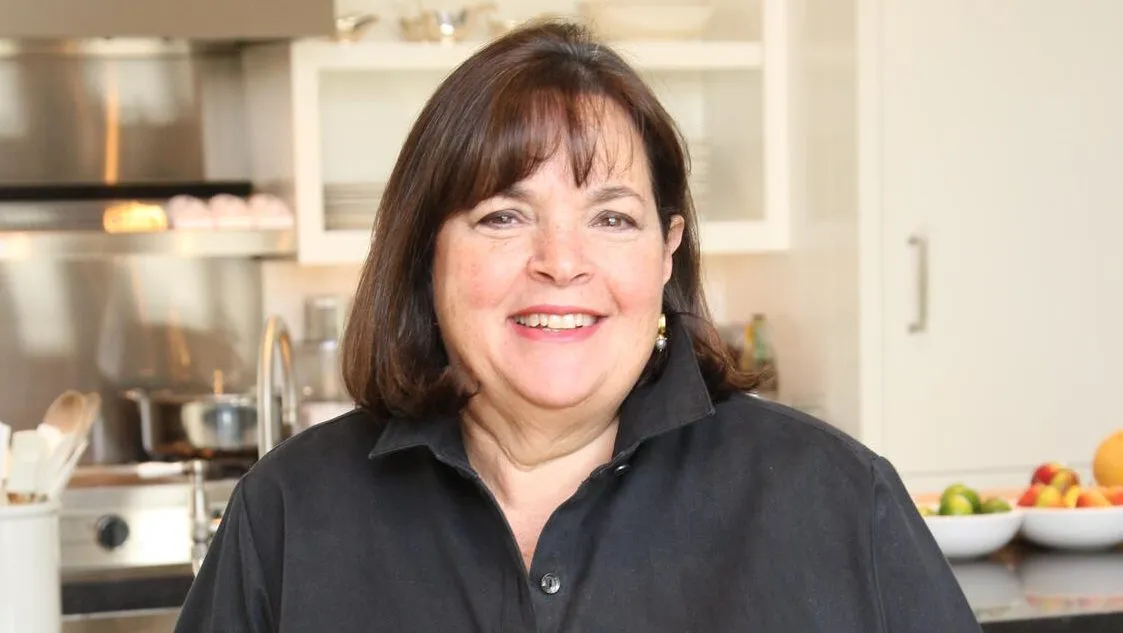 Chef Ina Garten smiling in her kitchen.