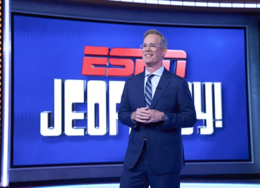 The ESPN Jeopardy! logo with a sports-themed background.