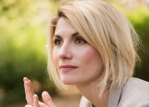 Jodie Whittaker looking sharp and professional for a media lawyer role.