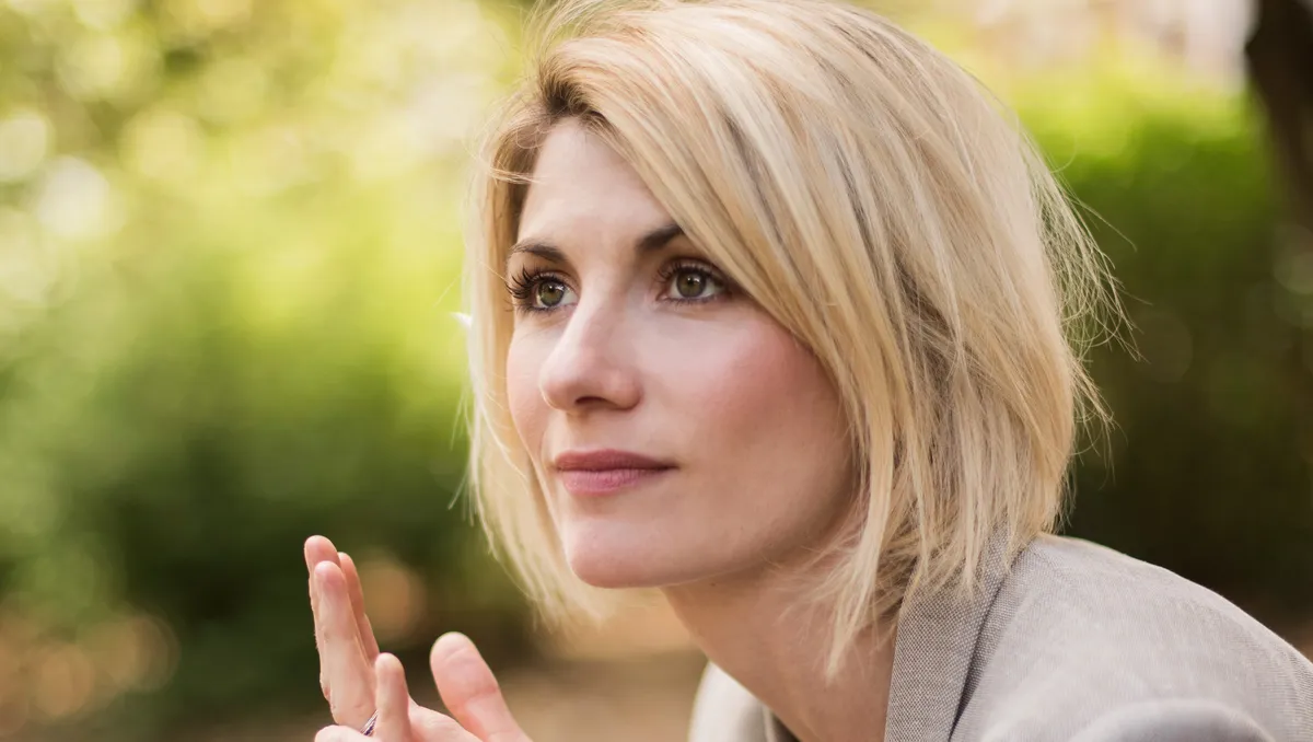 Jodie Whittaker looking sharp and professional for a media lawyer role.