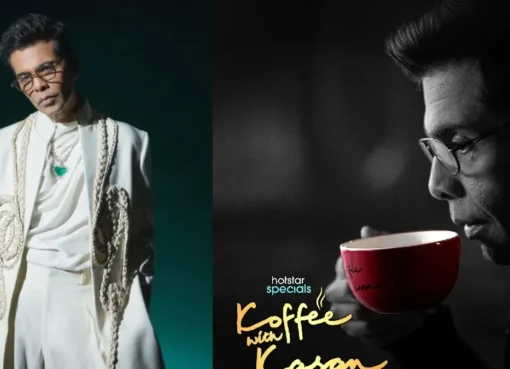 Karan Johar smiling on the colorful, plush set of Koffee With Karan, holding a coffee mug.