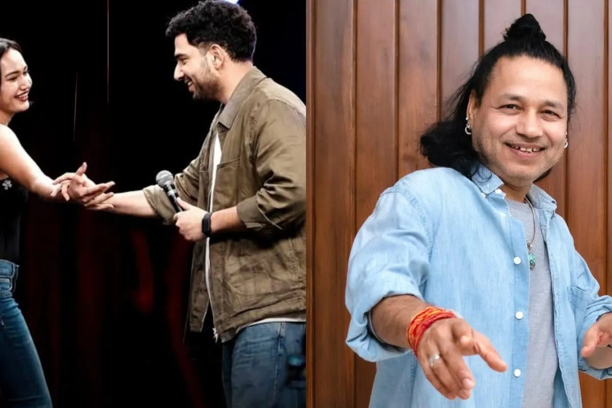 Kailash Kher on a TV show stage, reacting with a serious expression.