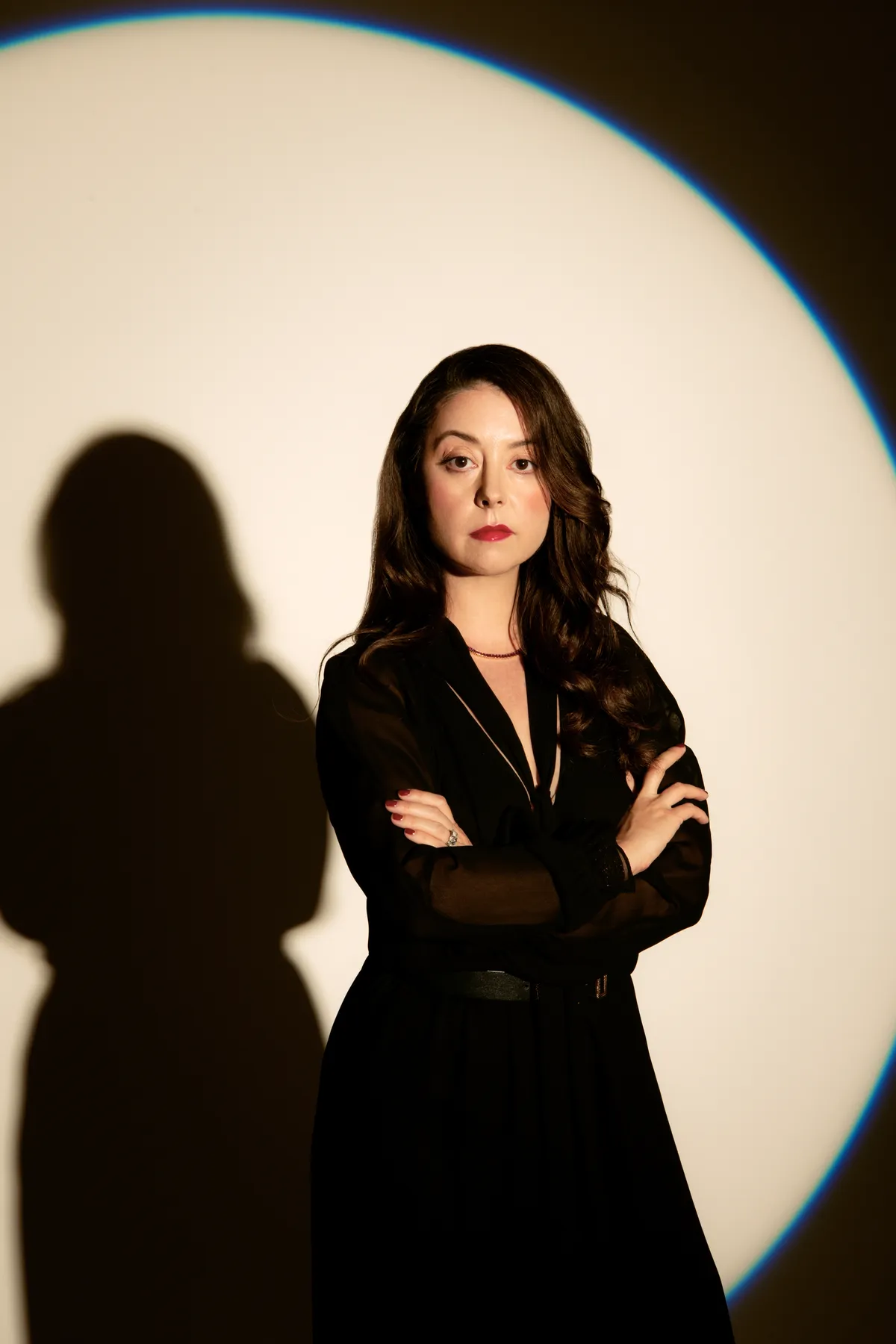 Karina Longworth, a podcast host, speaking into a microphone.