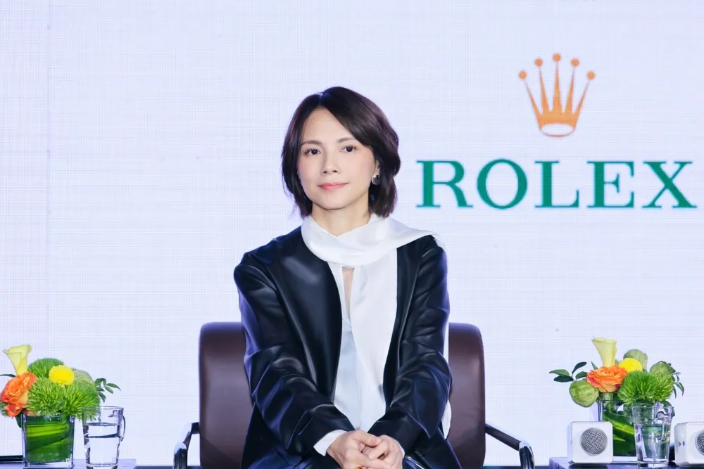 Lee Sinje smiling at a film festival.