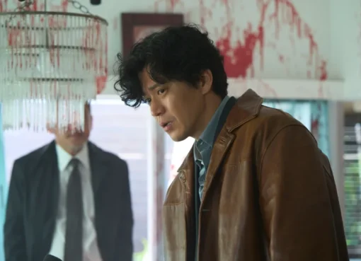 A dark, atmospheric scene from 'Bad Lieutenant: Tokyo' showing a character in a gritty Tokyo street.