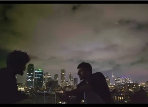 Dramatic still image from the documentary NAZA, showing intense subject matter with a compelling visual style.