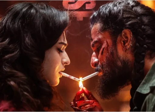 Actor Nani looking thoughtful in a scene from 'The Paradise' movie.