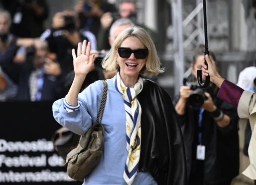 Naomi Watts smiling and speaking at the San Sebastián Film Festival press conference.