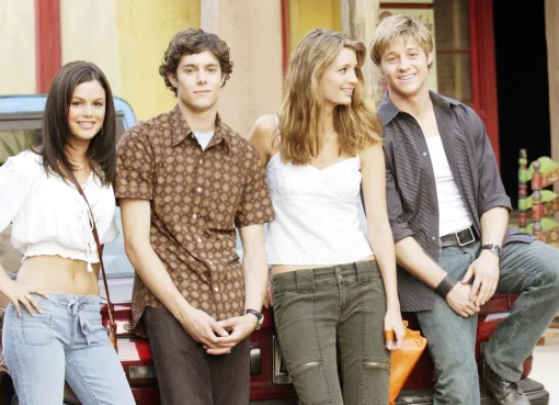 Ben McKenzie smiling in a casual setting.