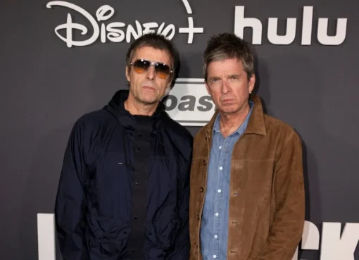 Noel and Liam Gallagher of Oasis, perhaps smiling or looking at each other.