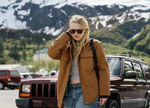 Dakota Fanning and Jake Johnson in a movie scene.