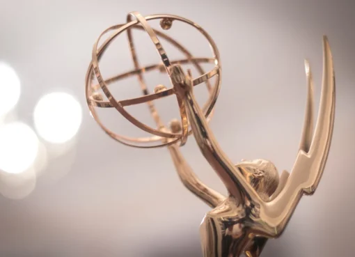 A colorful graphic showing Emmy award predictions and winners