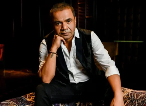 Actor Rajpal Yadav looking concerned during a court case update
