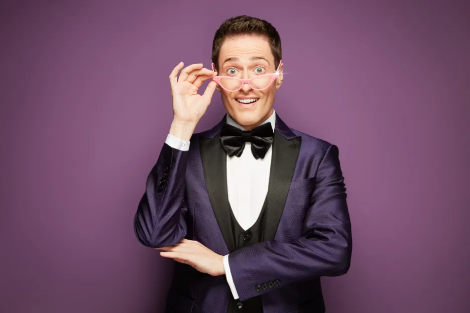 Randy Rainbow looking stylish in his signature glasses.