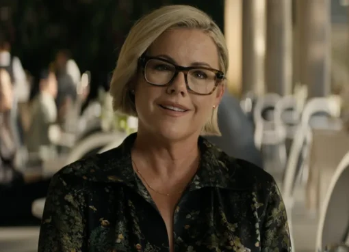 Kathleen Robertson smiling, possibly in a professional setting.