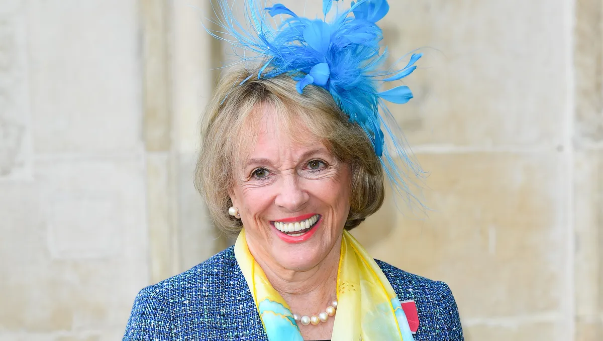 A portrait of Dame Esther Rantzen smiling.