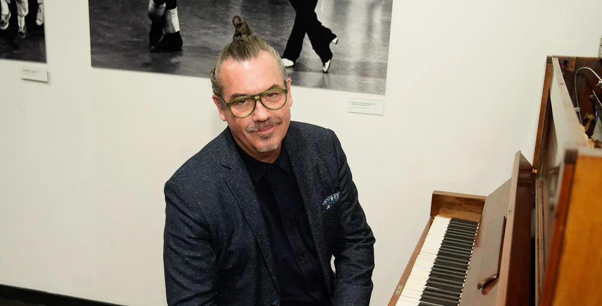 A photo of musician Duncan Sheik looking thoughtful