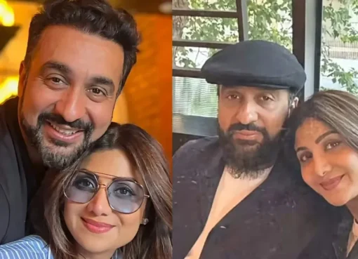 Shilpa Shetty smiling happily, holding a sweet treat or cookie for her husband's birthday.