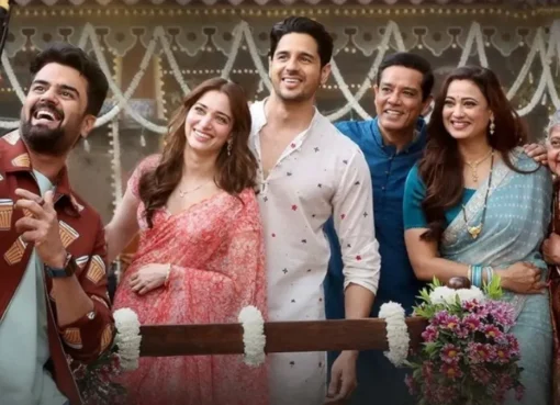 Sidharth Malhotra and Tamannaah Bhatia smiling at a movie event.
