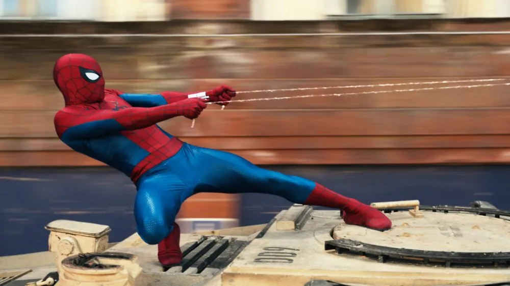 Spider-Man swinging heroically with a city skyline in the background, possibly with a subtle Star Wars logo in the distance looking defeated.