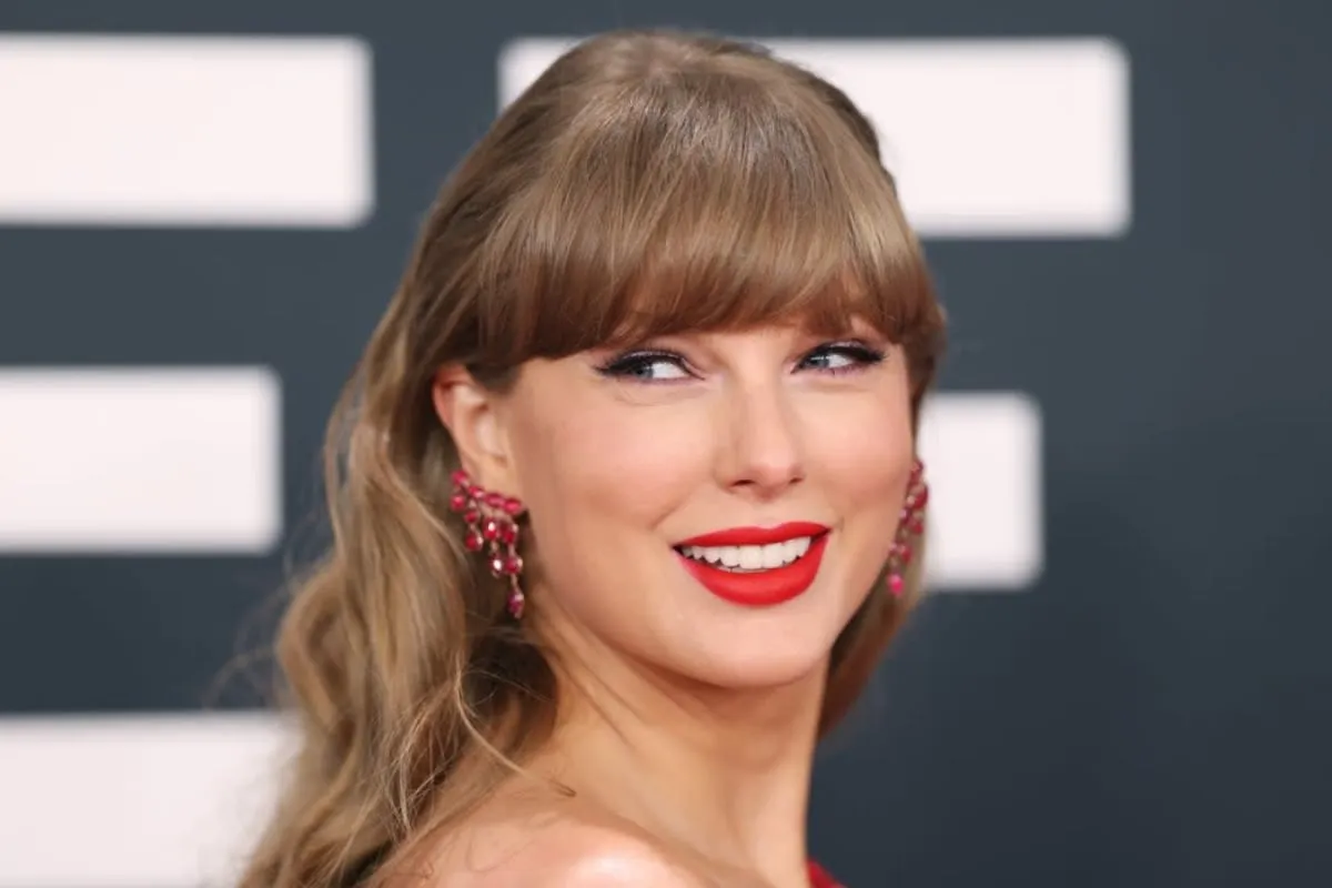 Taylor Swift announcing her new album with a vintage poster-like graphic.