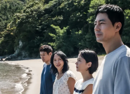A film still showing a subtle, reflective moment from a Korean drama by Lee Chang-dong, possibly a character in thought.