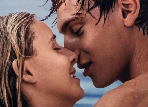 A moody scene from a young adult romance film on a laptop screen