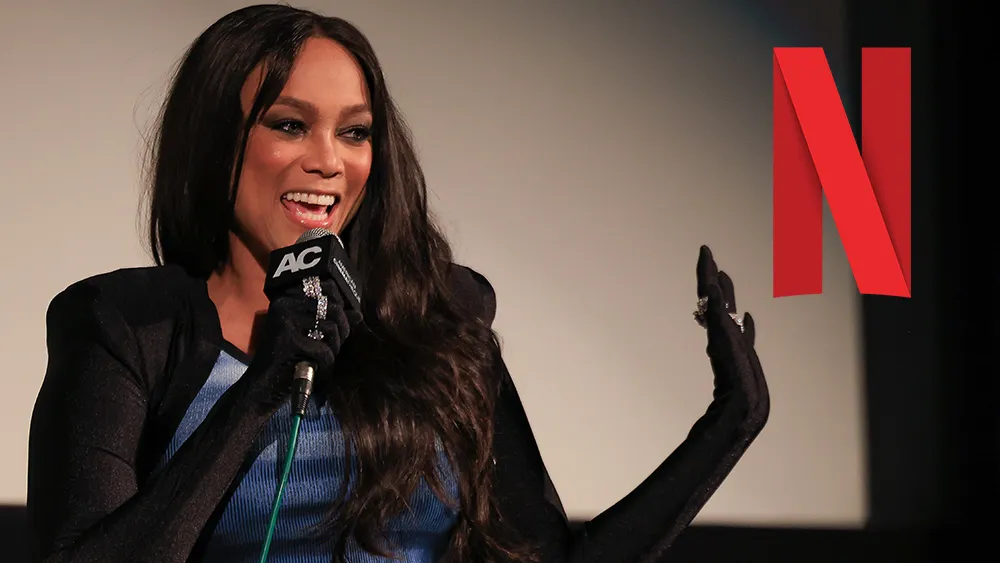 Tyra Banks in a formal setting, possibly a courtroom or studio.