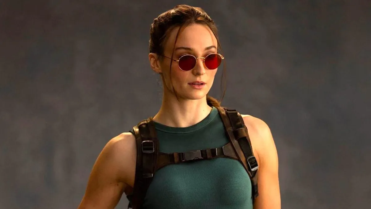 Lara Croft standing in a jungle, ready for adventure.