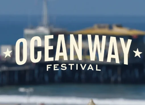 A sandy beach with waves crashing, representing the canceled festival.