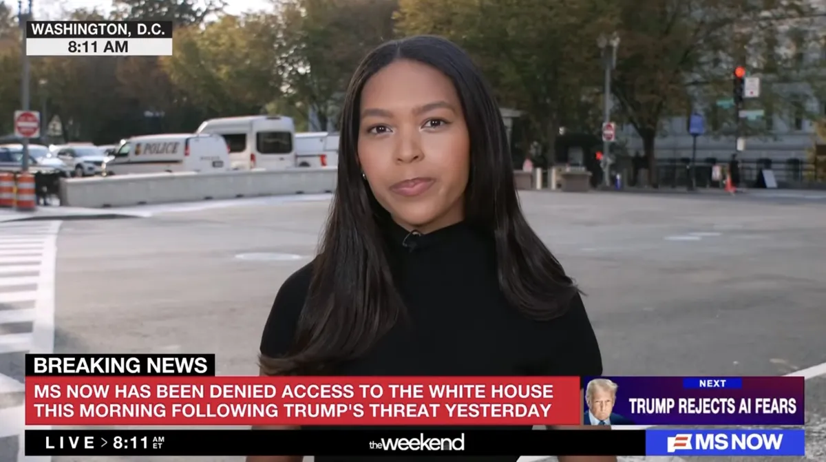 White House gates with a 'Denied Access' sign, symbolizing journalists being turned away.