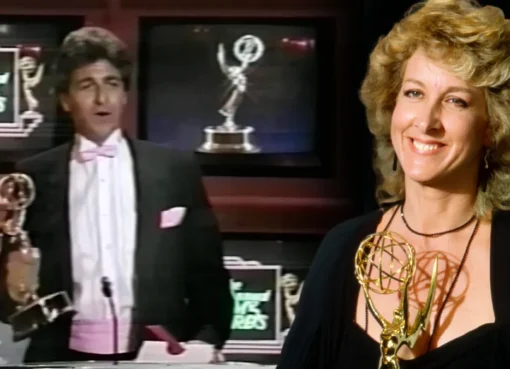 A photograph showing the grand stage and audience at the 1985 Emmy Awards, likely with John Forsythe hosting.