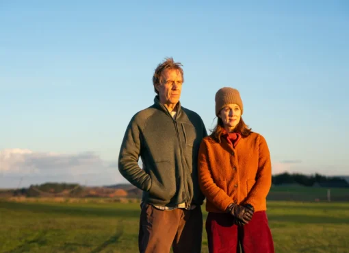 Laura Linney and Rhys Ifans in a gentle, compassionate movie scene.