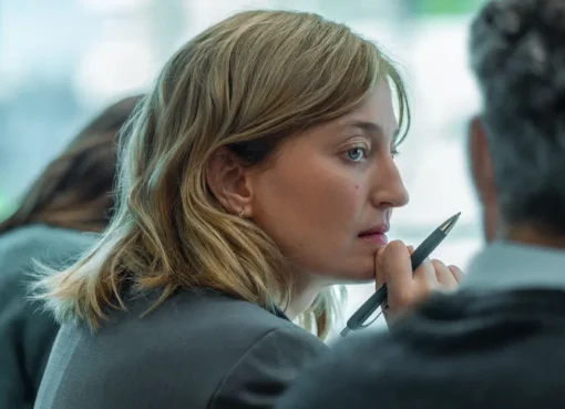 Alba Rohrwacher and Vincent Lindon in a tense office scene, looking serious, from the trailer of Stéphane Brizé's film, A Good Little Soldier.