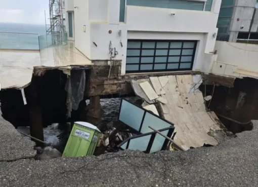 A large sinkhole has opened up under a beachfront home in Malibu.