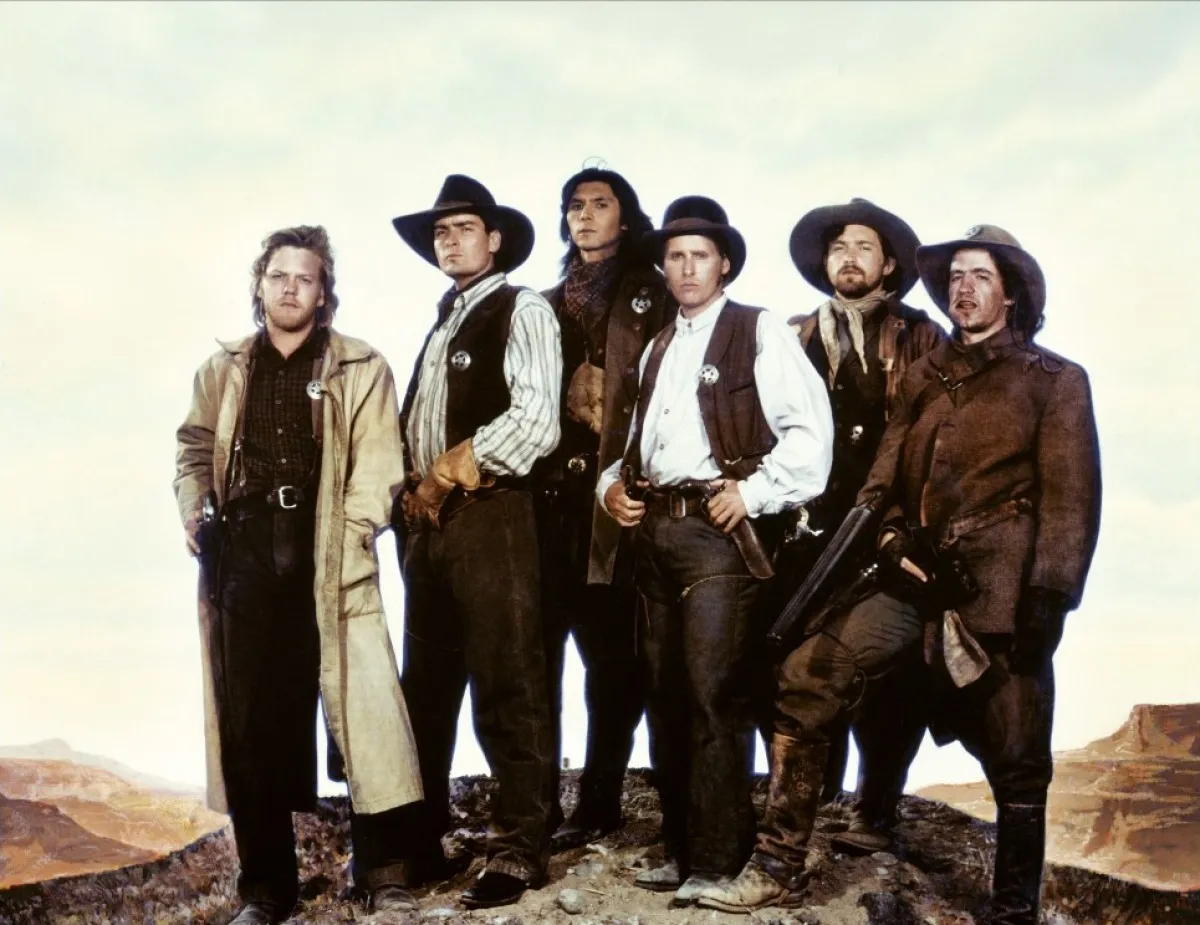Photo of Young Guns cast members reunited at a fan event.