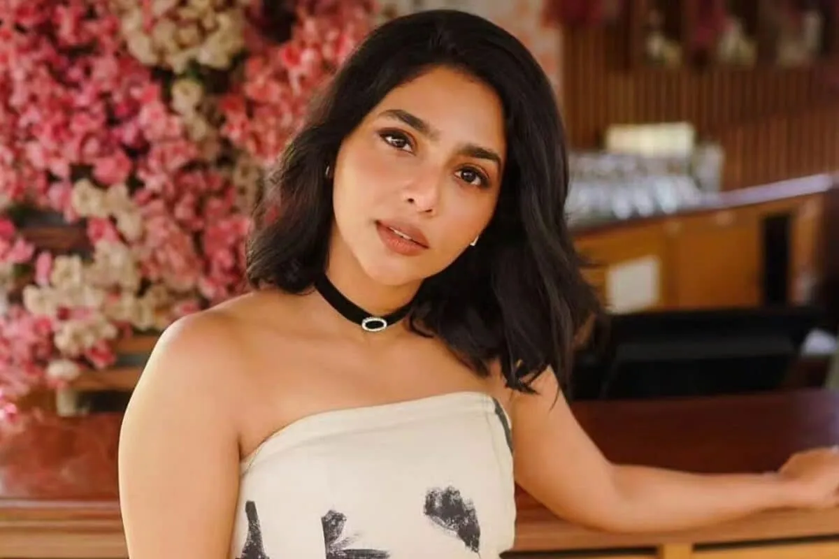 Aishwarya Lekshmi looking thoughtful.