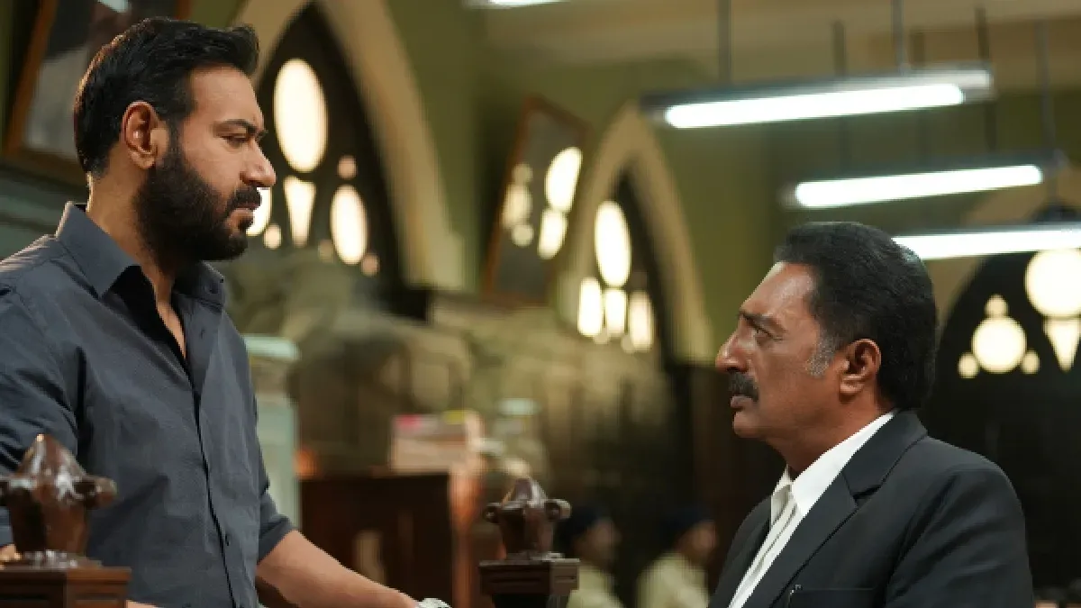 Ajay Devgn looking intense in a promotional image for Drishyam 3, with a serious expression.