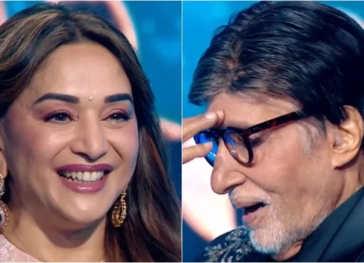 Madhuri Dixit smiling playfully next to a slightly amused Amitabh Bachchan.
