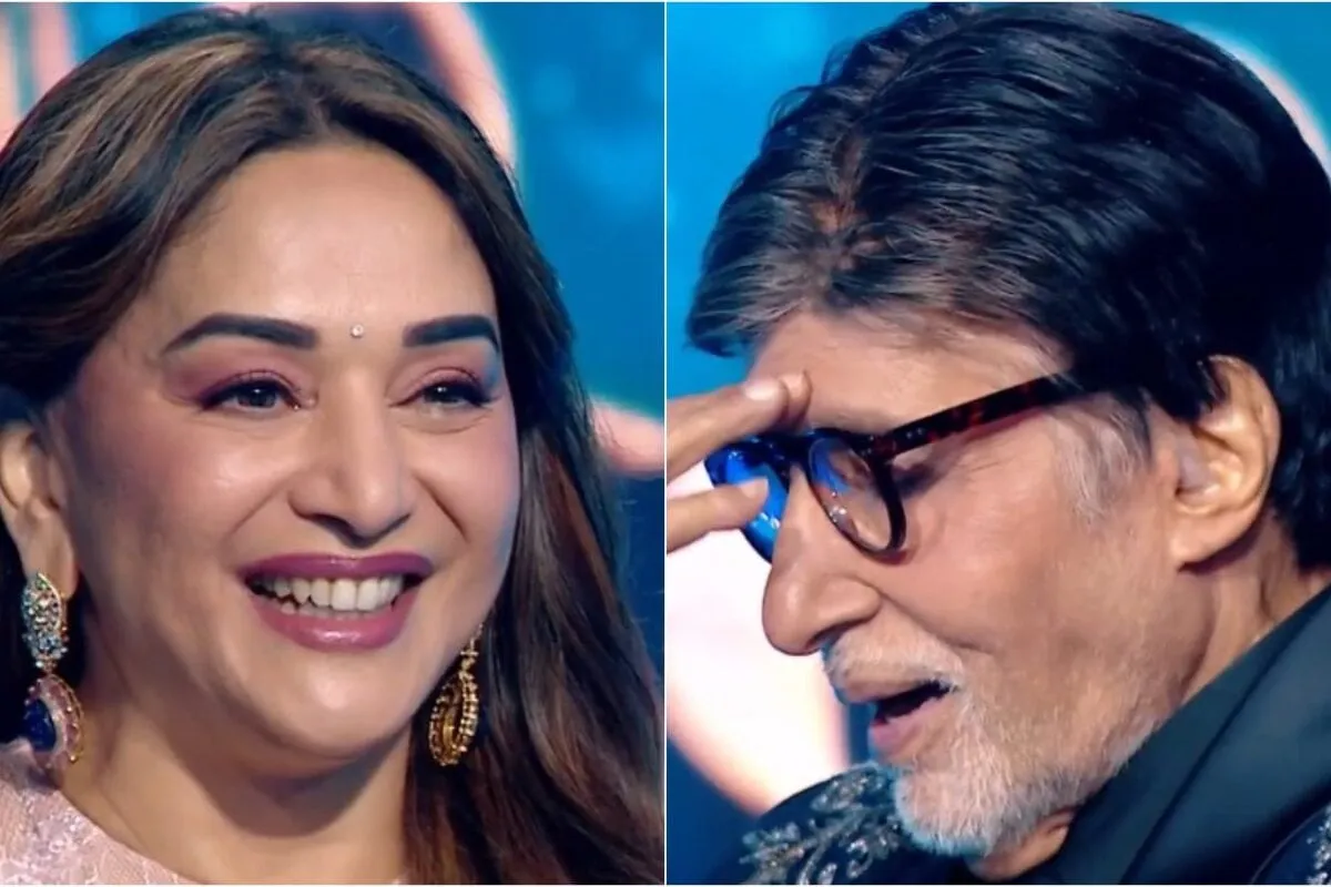 Madhuri Dixit smiling playfully next to a slightly amused Amitabh Bachchan.