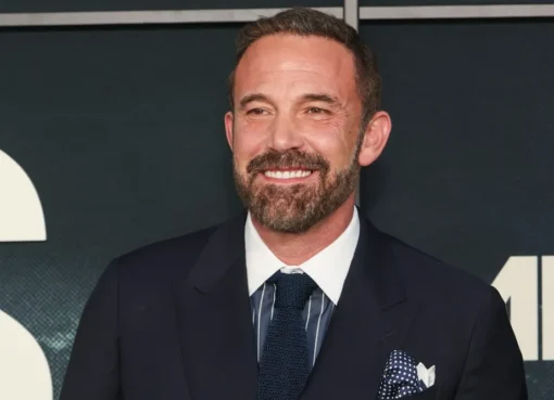 Ben Affleck looking serious in a suit, possibly from his new movie 'Animals'.