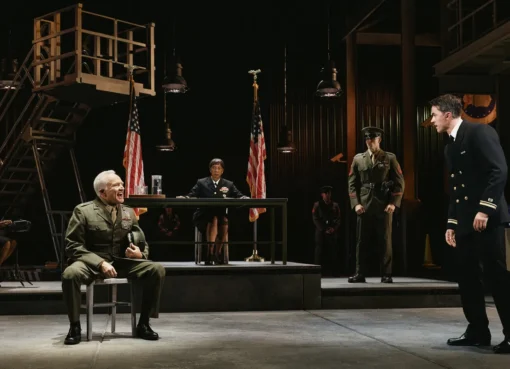 Bradley Whitford and Tom Blyth performing on a Broadway stage