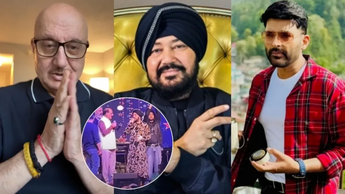 Daler Mehndi performing on stage, smiling, with a mic in hand.