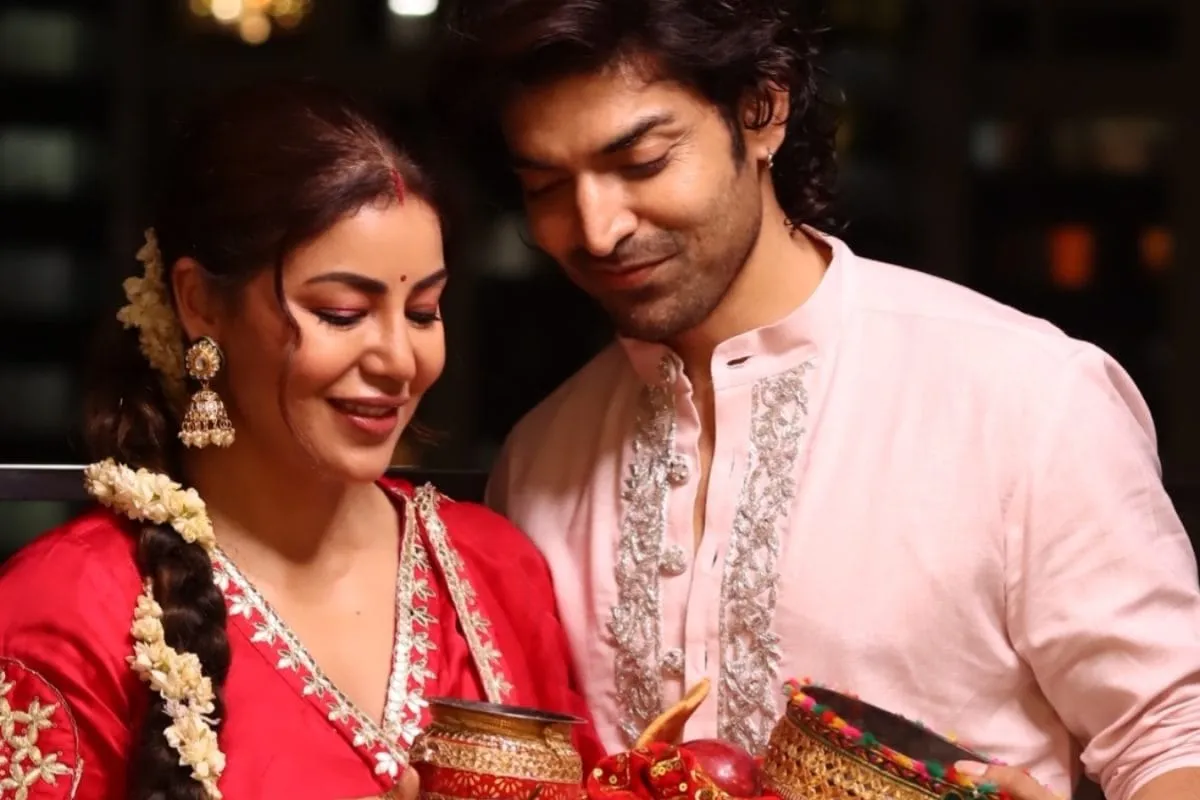 Debina Bonnerjee and Gurmeet Choudhary smiling and posing together