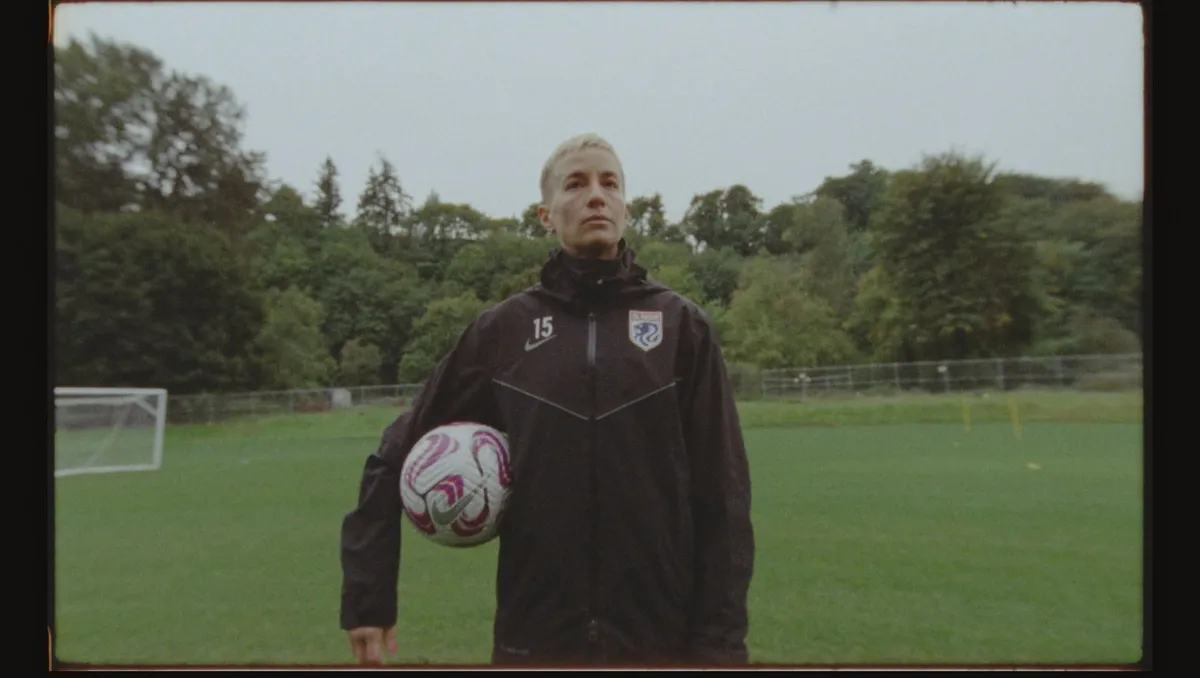 A film reel next to a soccer ball with a world map in the background, symbolizing international cinema and sports documentaries.