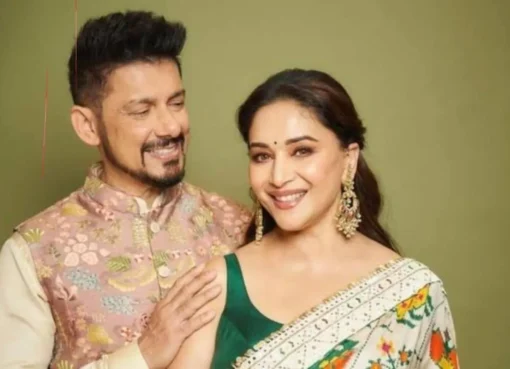 Dr. Shriram Nene and Madhuri Dixit smiling together.