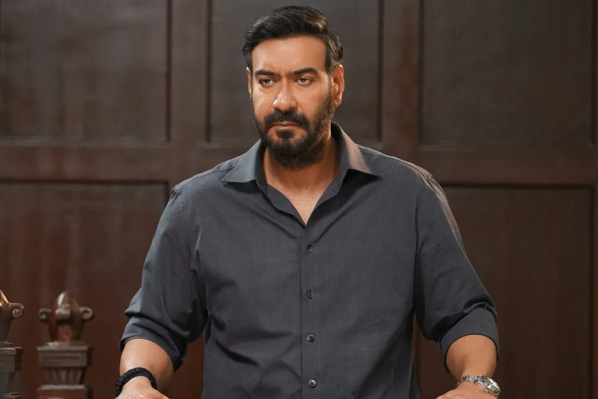 Ajay Devgn looking intense and thoughtful in a key scene from the movie Drishyam 3.