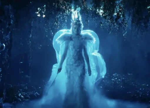 A magical forest scene from the 'Narnia: The Magician's Nephew' trailer, with shimmering trees and a path leading into light.