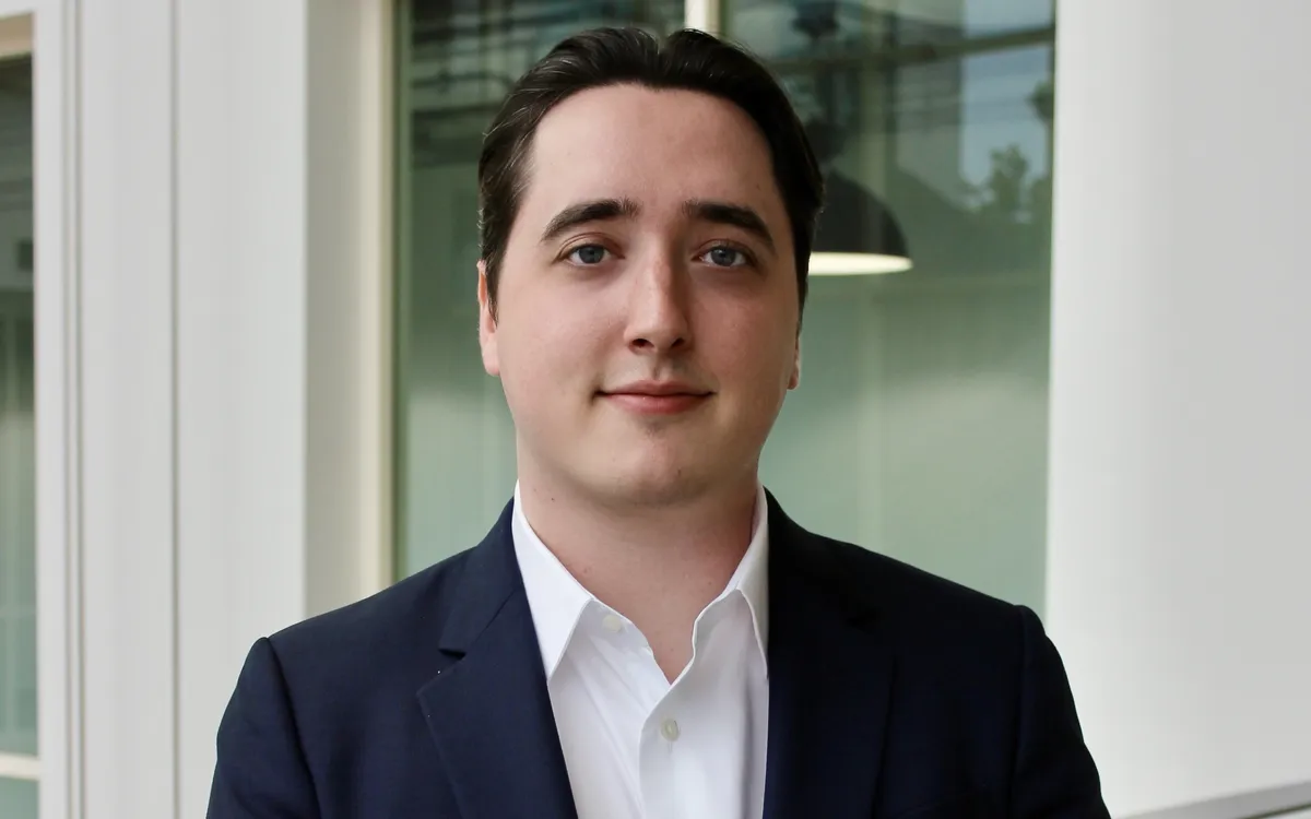 A professional shot of a talent agent in a modern office environment.
